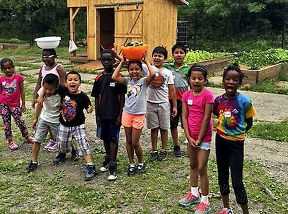 south hills interfaith ministries children gathered for gardening
