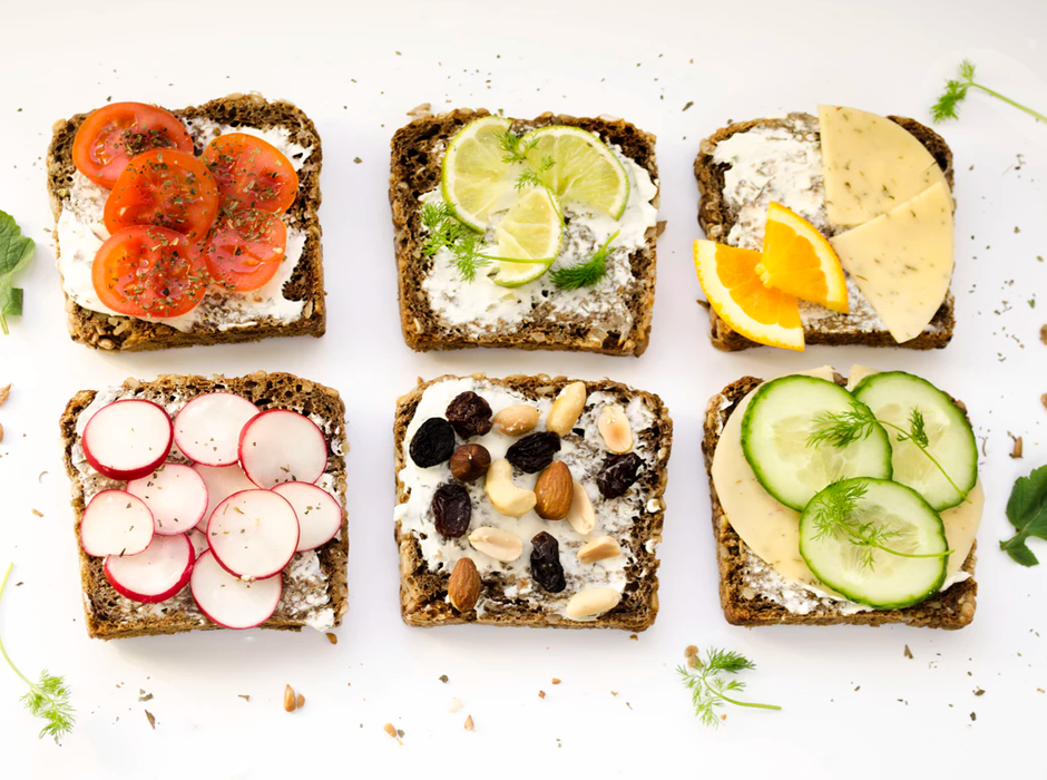 bread slices with tomatoes, radishes, nuts, and cucumbers