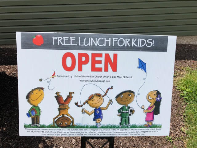 sign Sign outside of United Methodist Church Union advertising free lunch for kids
